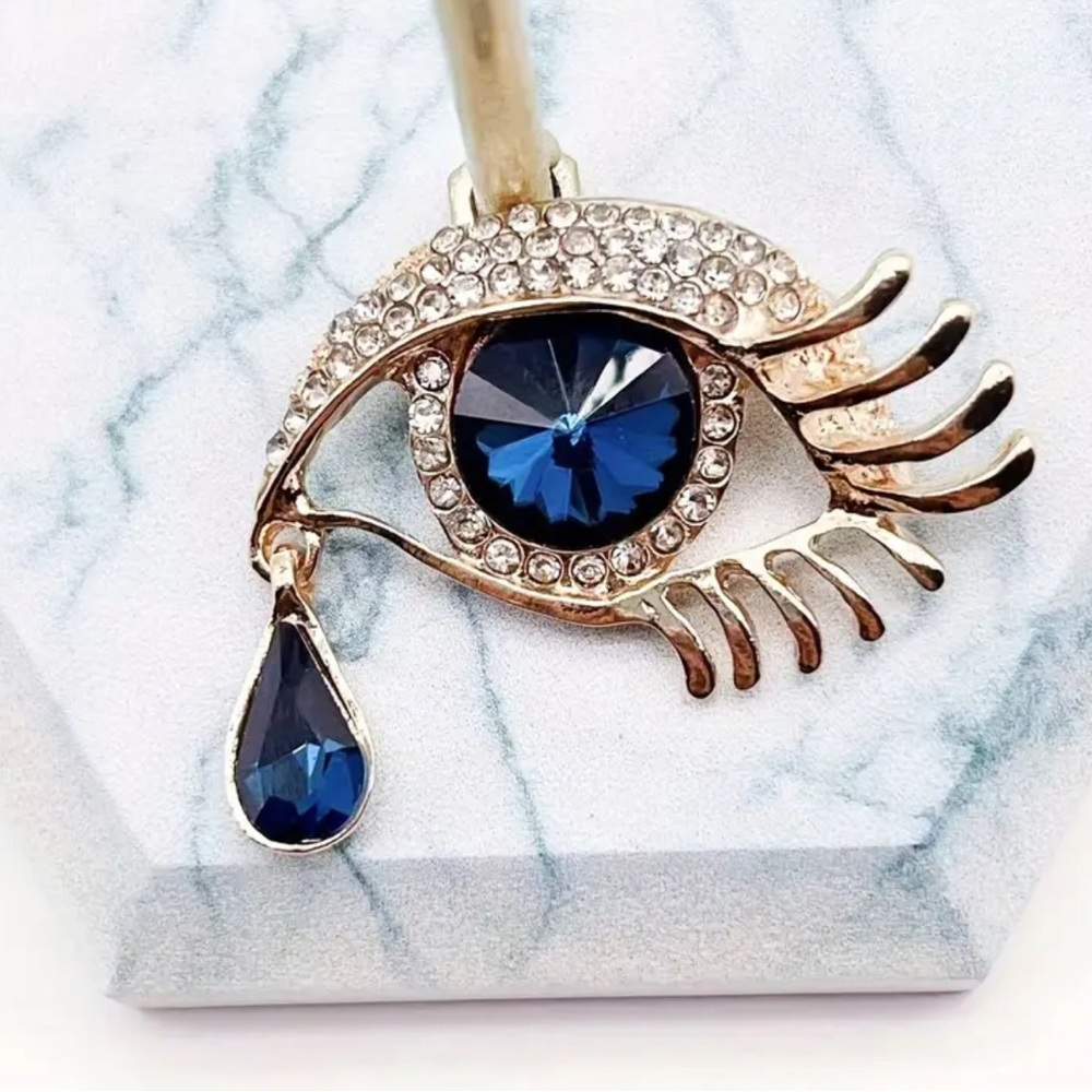 Elegant Blue and Gold Eye Pendant